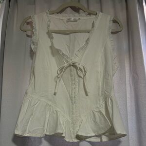 Vestique Cream Ruffle Sleeveless Blouse